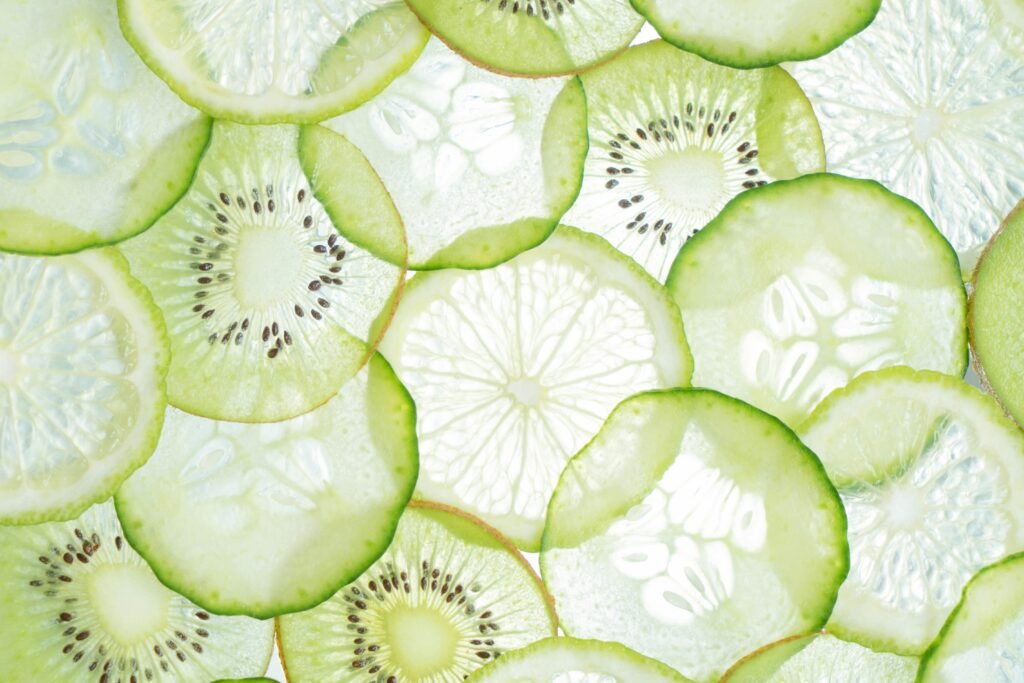 pexels photo 2171077 2171077 Close-up of fresh citrus and kiwi slices showcasing vibrant textures and colors.